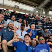 Group shot of DC alumni at Nationals Park.